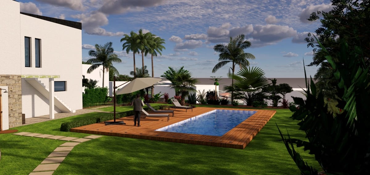 Vue sur la piscine d’un jardin tropical en Martinique Vue sur la piscine d’un jardin tropical en Martinique